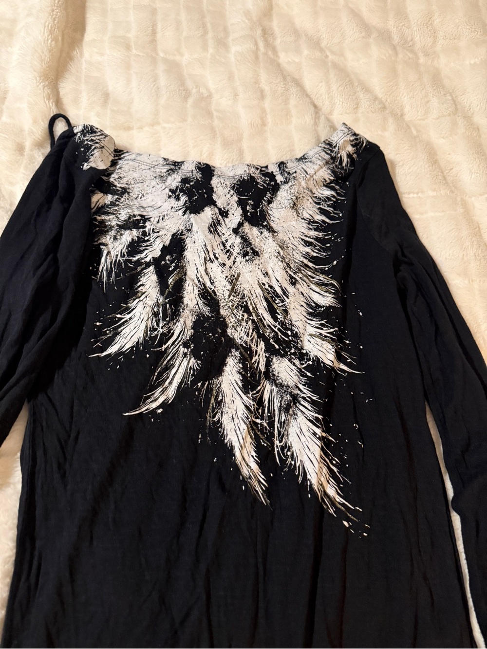 Black Long-Sleeve V-Neck Women's Top with white feather design in back.
